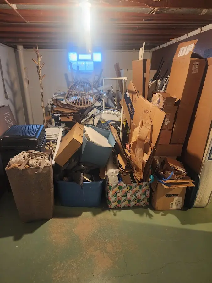 Roll-off dumpster container at job site for Concrete Dumpster Rental in East Milton